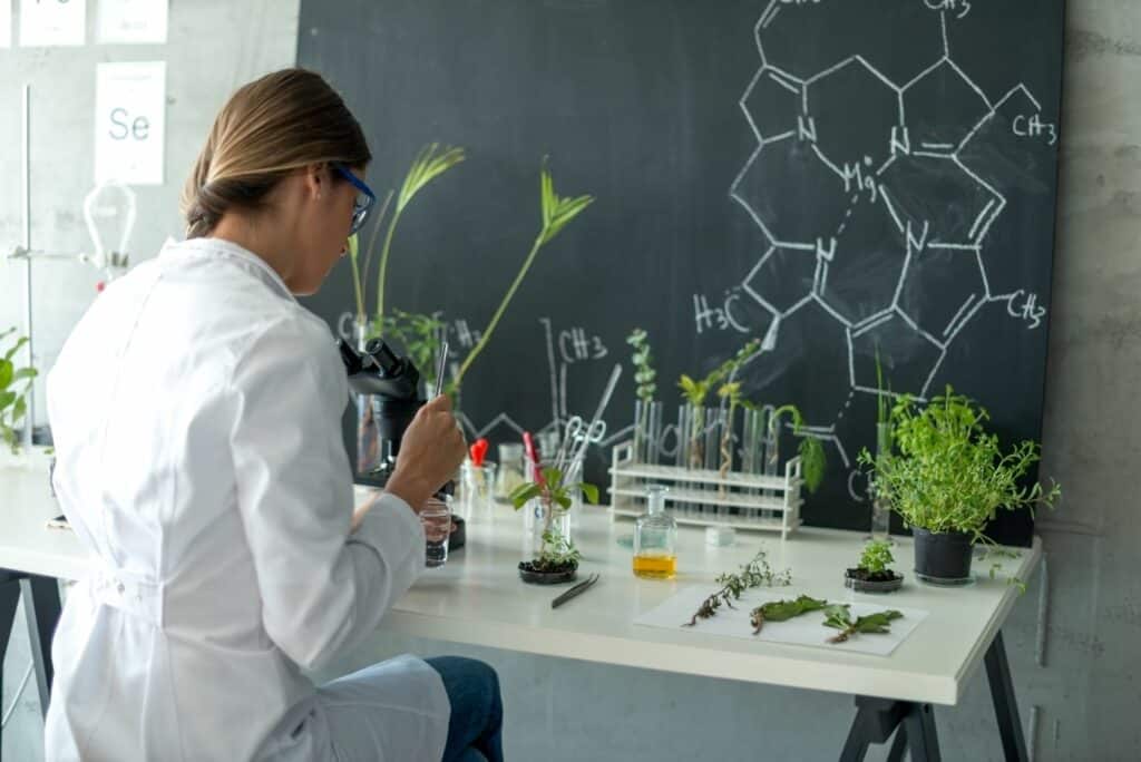 biologist-taking-experiment-with-plants-How Much Does a Plant Biologist Make