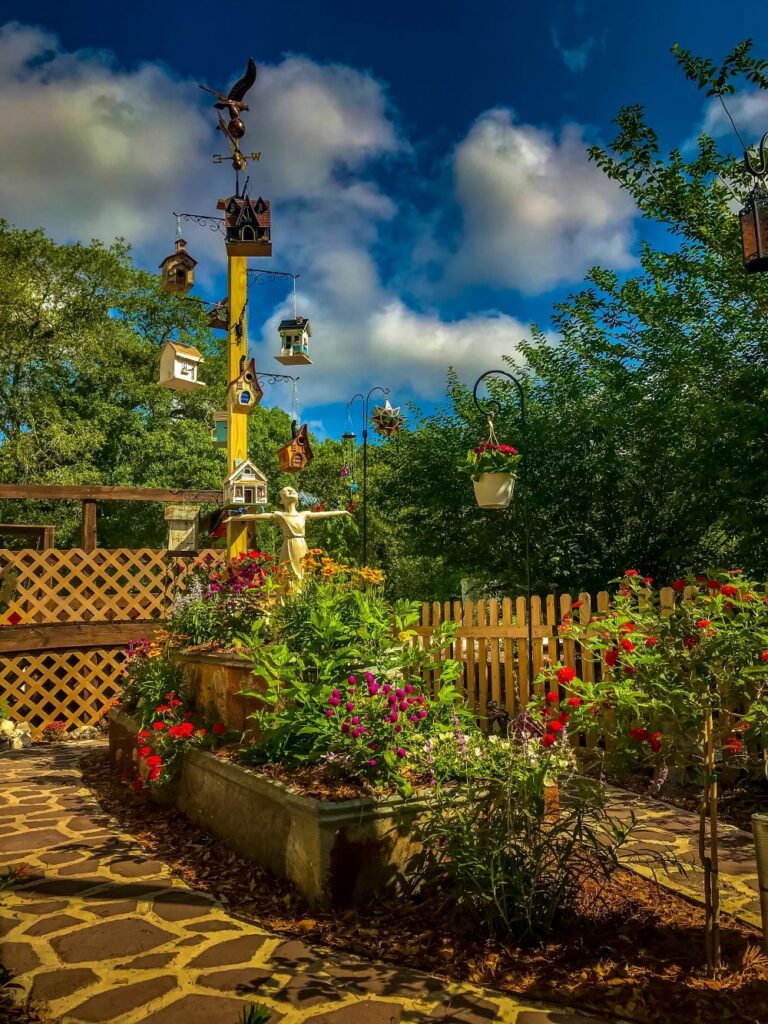 a 3 tiered flower bed in a beautiful little garden 2023 11 27 05 21 26 utc 1