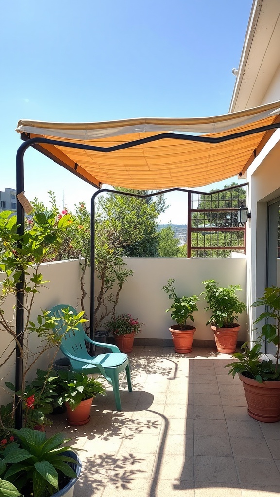 Small garden patio with orange shade canopy and potted plants.